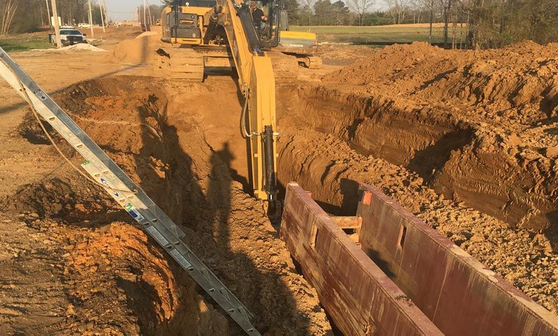 sewer system installation trench digging